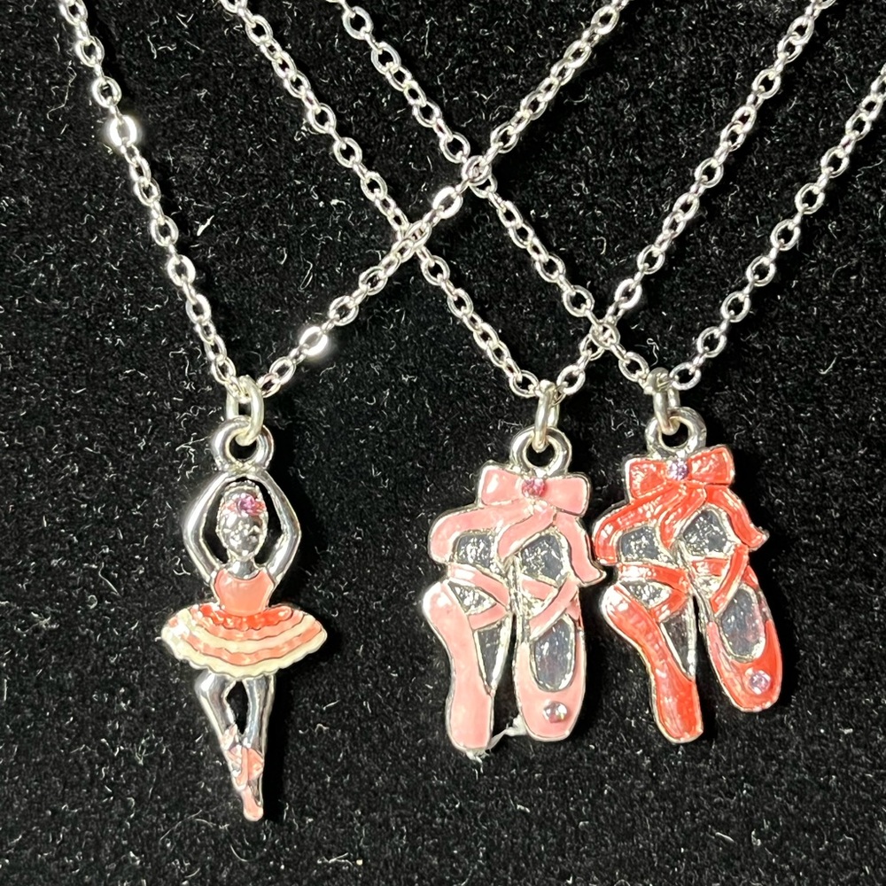 NWOT 9 girls necklaces. 16” silver tone chain. 5 ballerinas & 4 ballet shoes